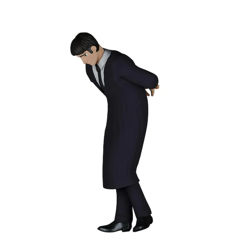 Mężczyzna-sędzia idzie zgięty z rękami za ciałem i głową w dół